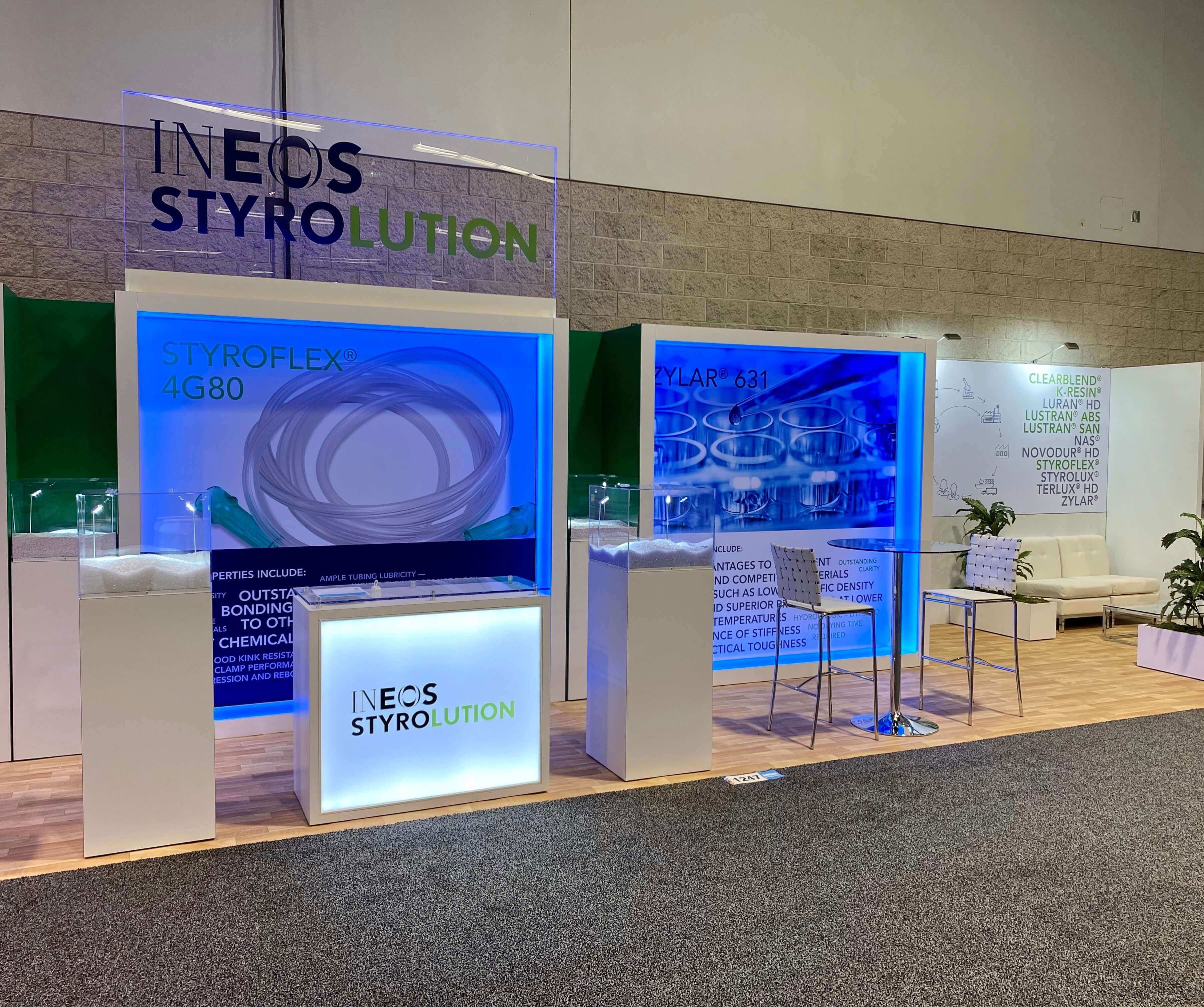 10x40 inline booth - with ineos logo and product displays