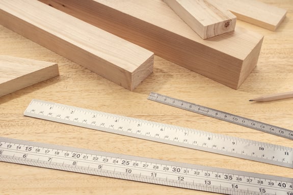 different lengths of wood materials and rulers